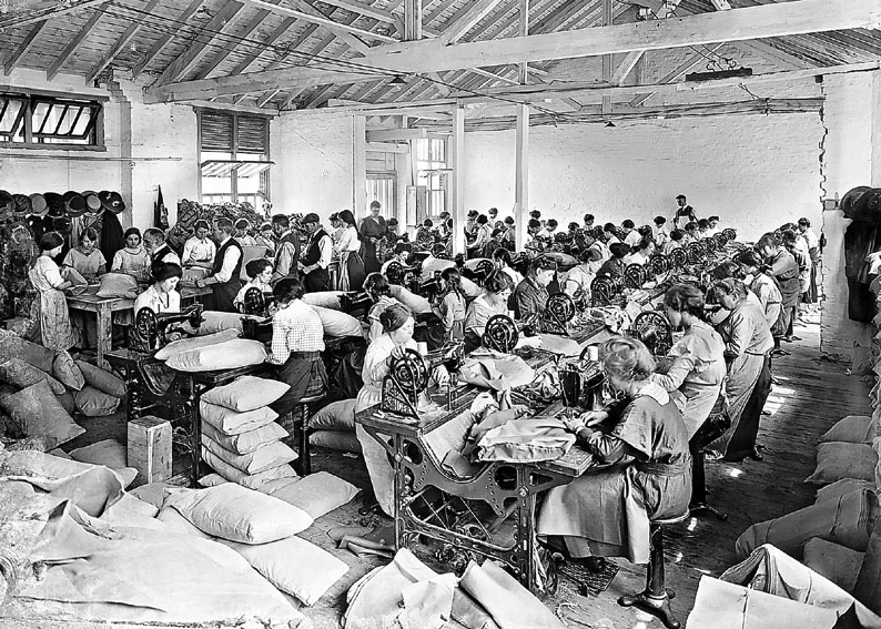 Sewing factory in late Victorian England.png